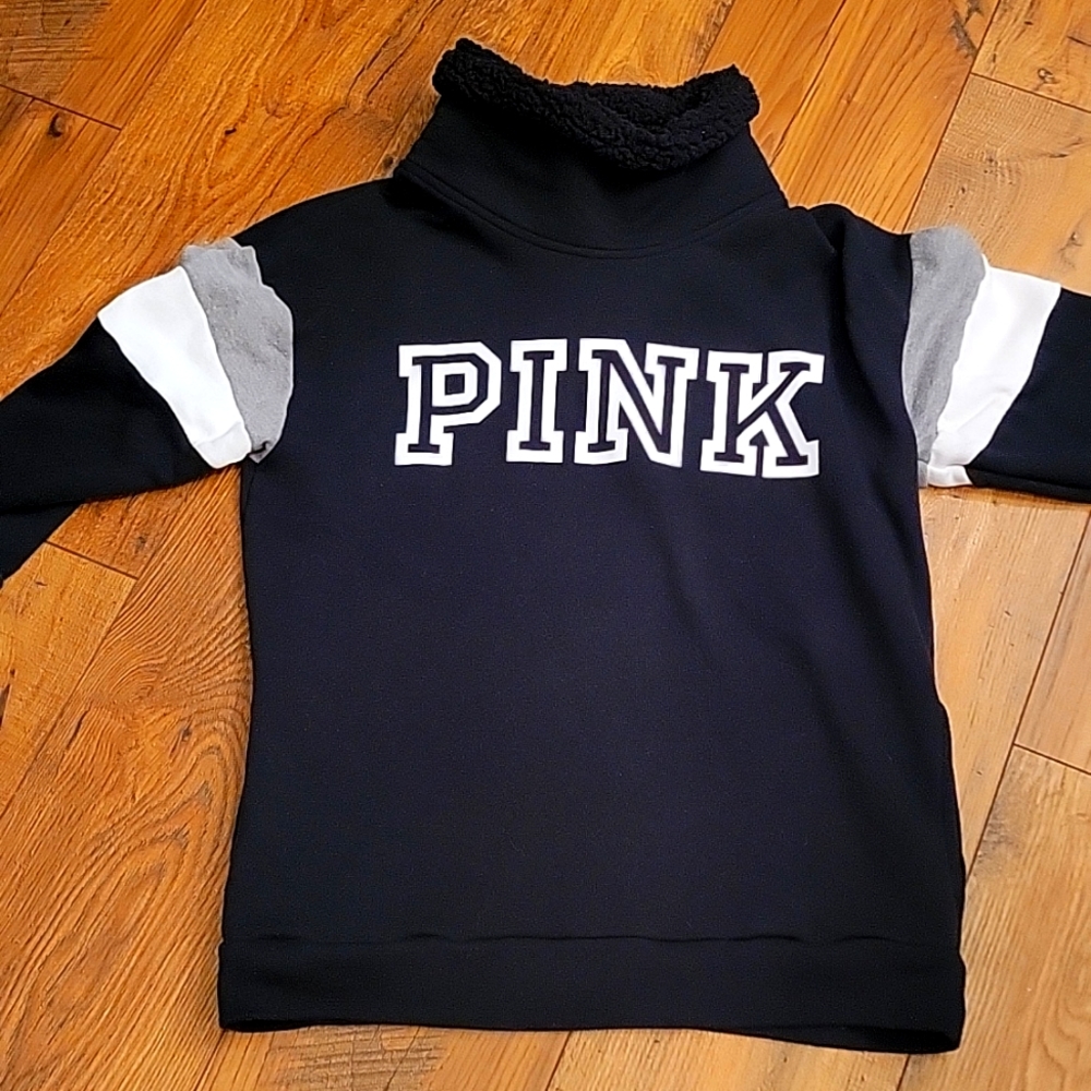 Pink sweatshirt.